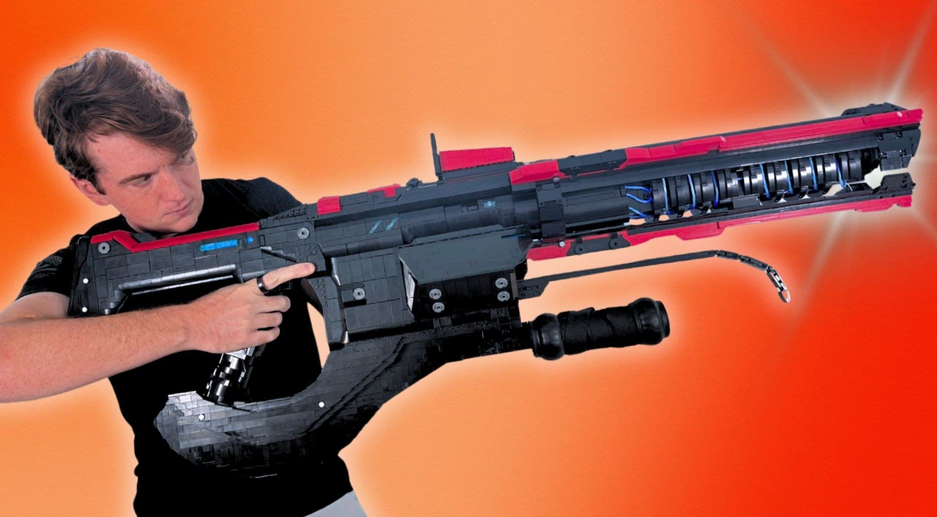 The life-size LEGO Halo Shock Rifle, raised to the shoulder and sighted down its length